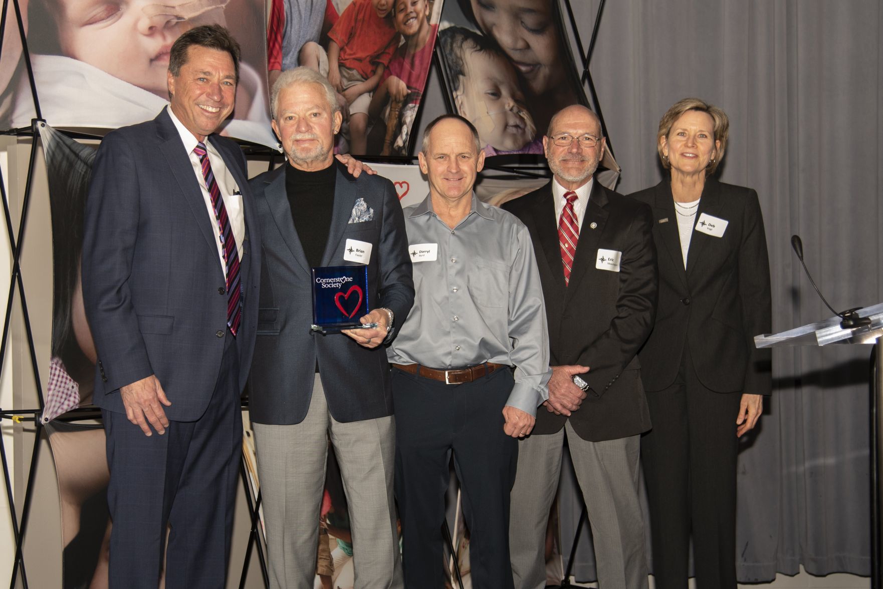Ronald McDonald House Charities of St. LouisÕ Cornerstone Society Organization Award Ð IUOE Local 148. Pictured are Dan Harbaugh, Brian Favier, Darryl Byrd, Eric Mooshegian, Deb Vogt.